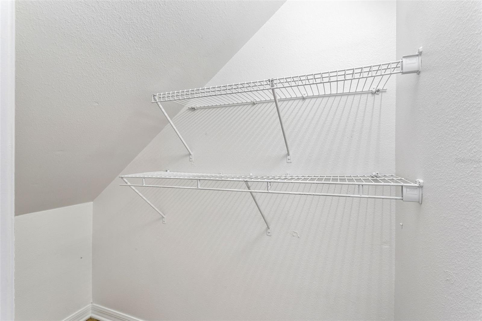 Storage room or hide away underneath the stairs provides ample space.