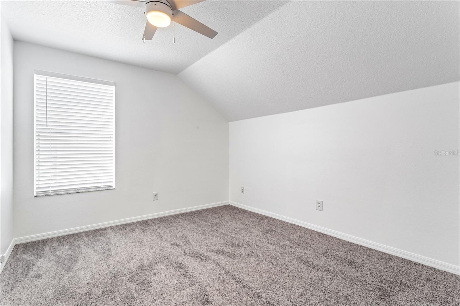 3rd bedroom brand new carpet, fan/light, freshly painted. New faux blinds. Closet.