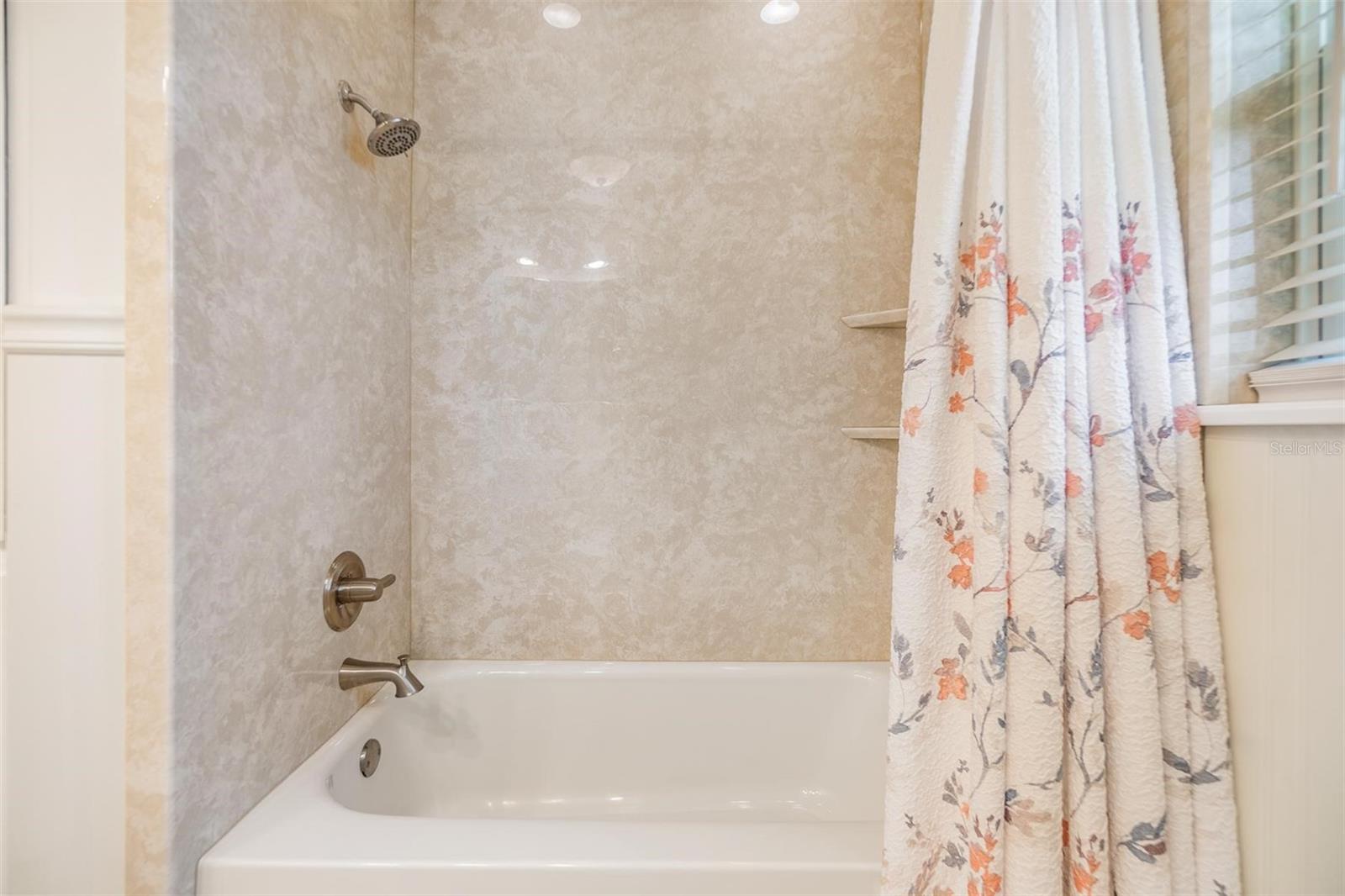 Completely remodeled guest bathroom with new vanity and Luxury Bath custom fitted Microban easy clean tub and wall surround.