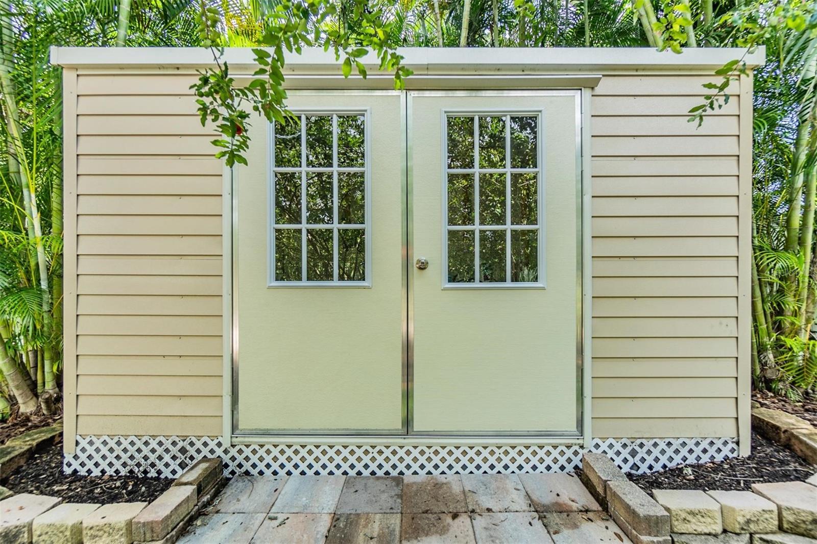 New (2024) 8x12 bungalow style shed secured with hurricane anchors