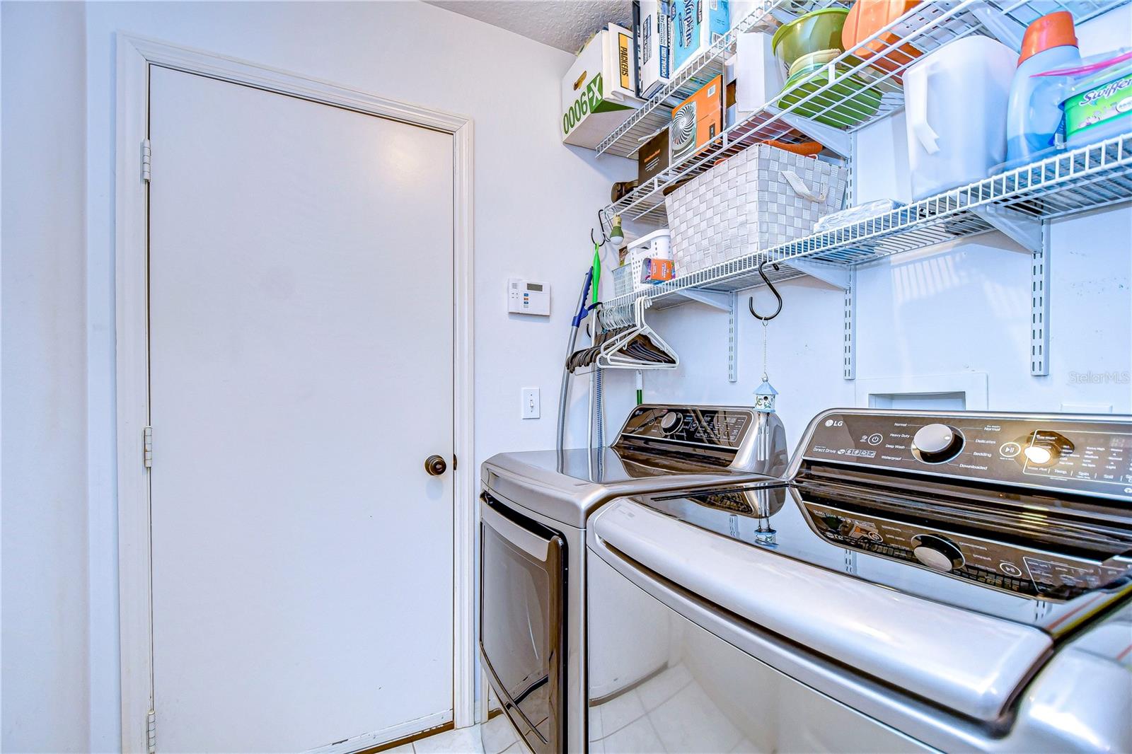 Laundry room with shelving!