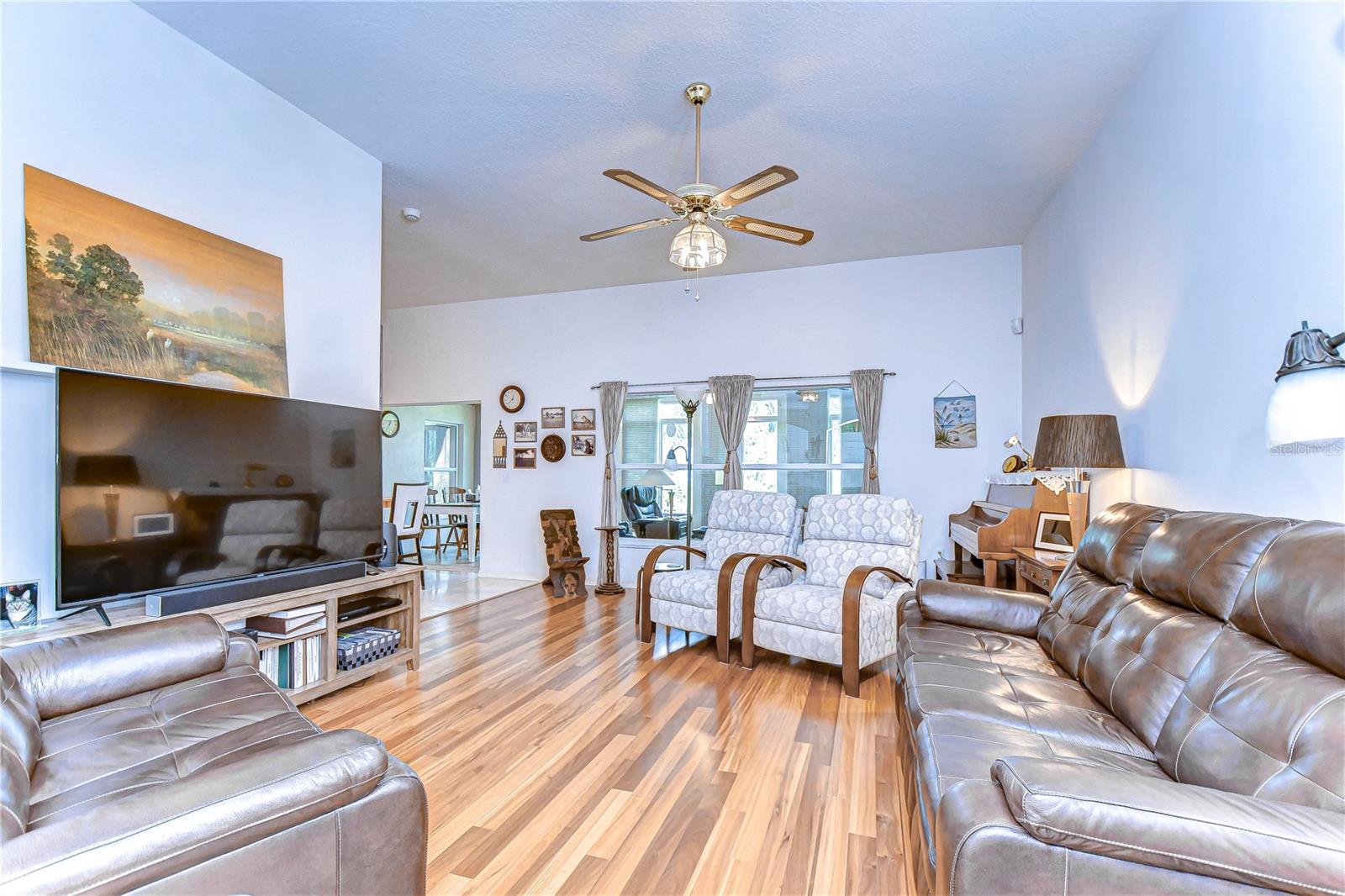 Family room with neutral paint palette is just waiting for you!