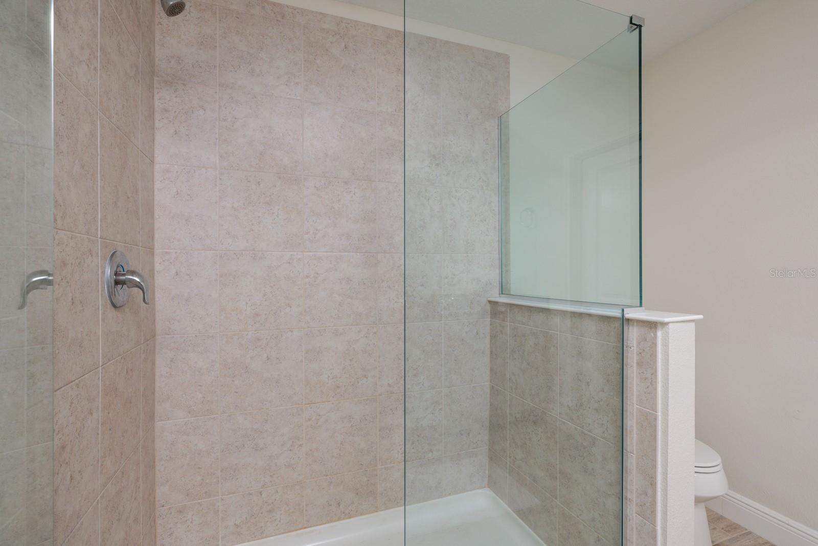 Primary Bath with large walk-in shower.