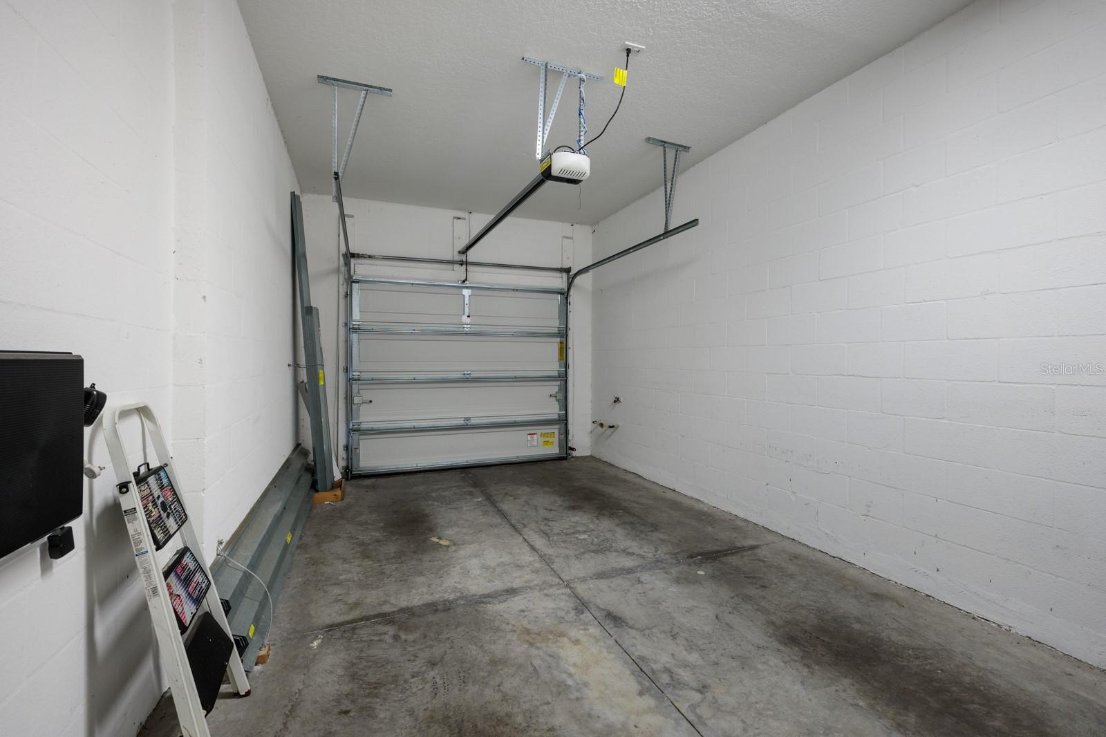 Garage with door opener.