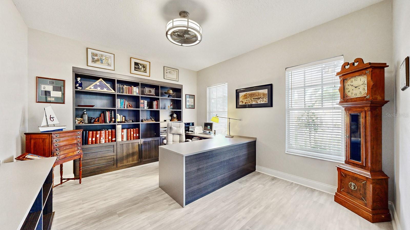 Home Office with Custom Built In Desk and Wall Cabinetry