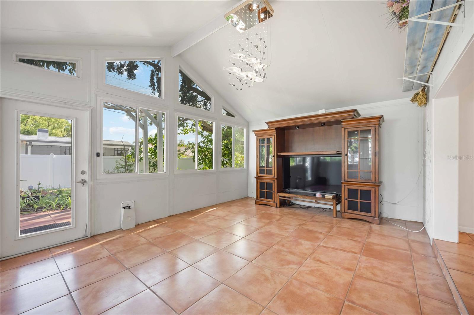 Look at the fabulous windows that overlook the backyard.