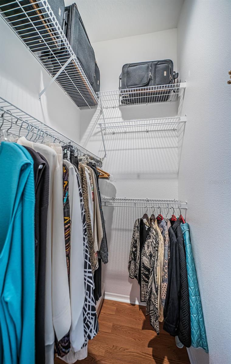 Primary Suite walk in closet