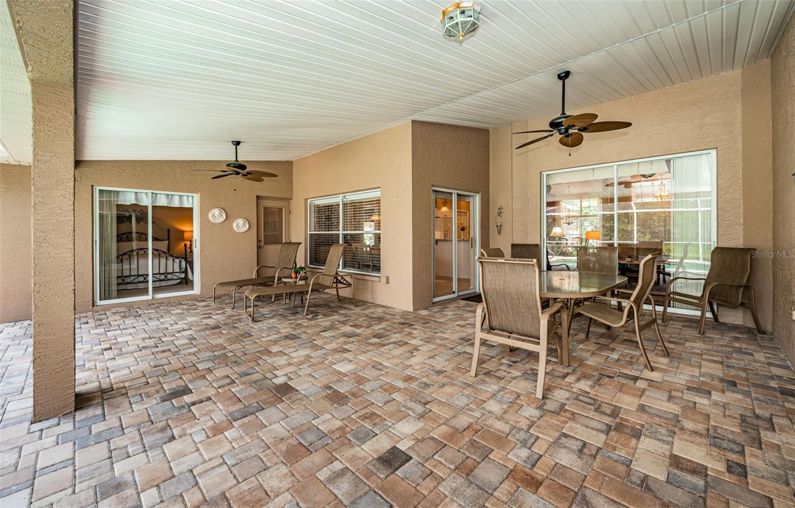 Extended covered lanai upgraded paver deck