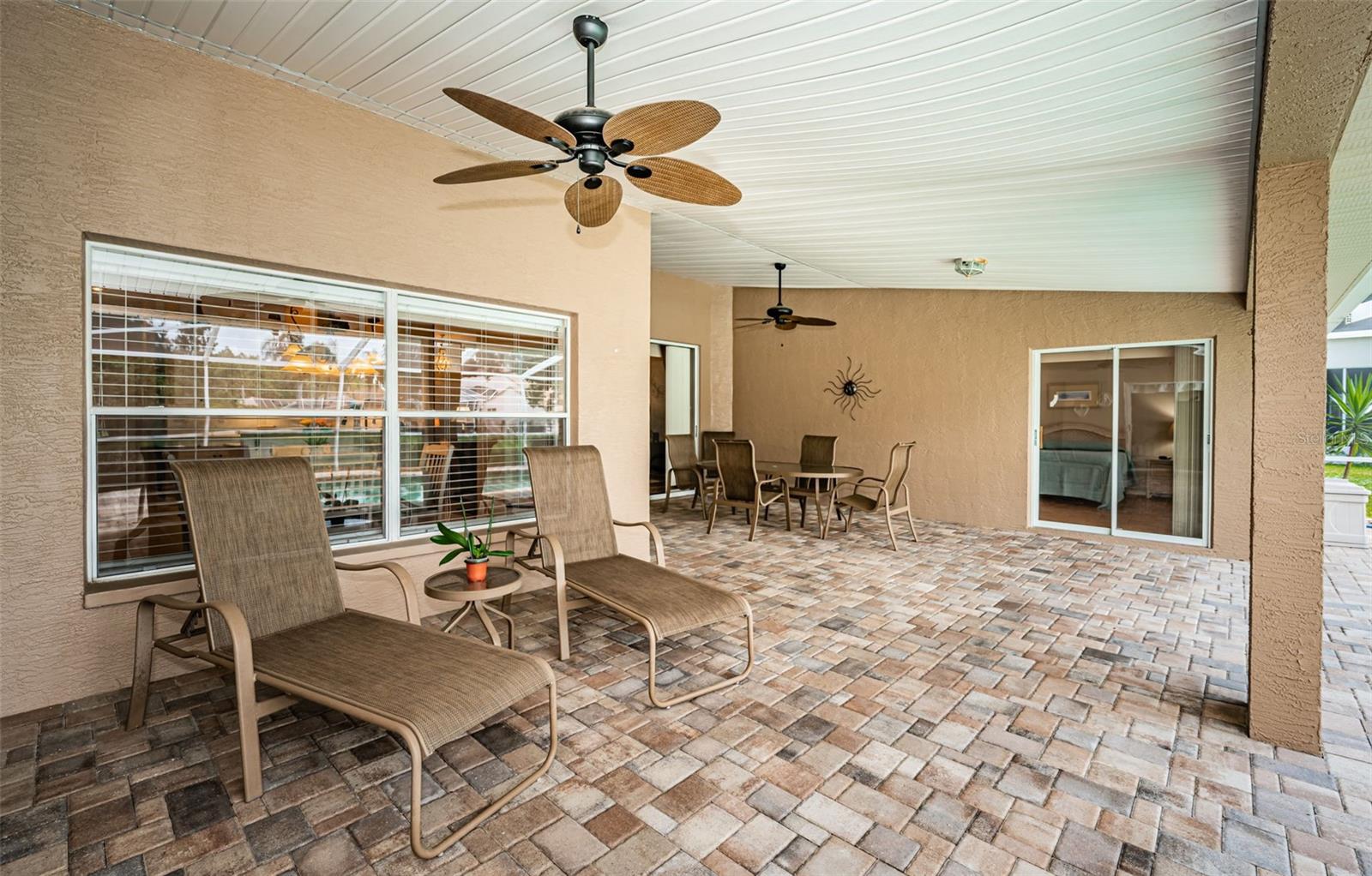 Covered Lanai - sliders to the primary suite