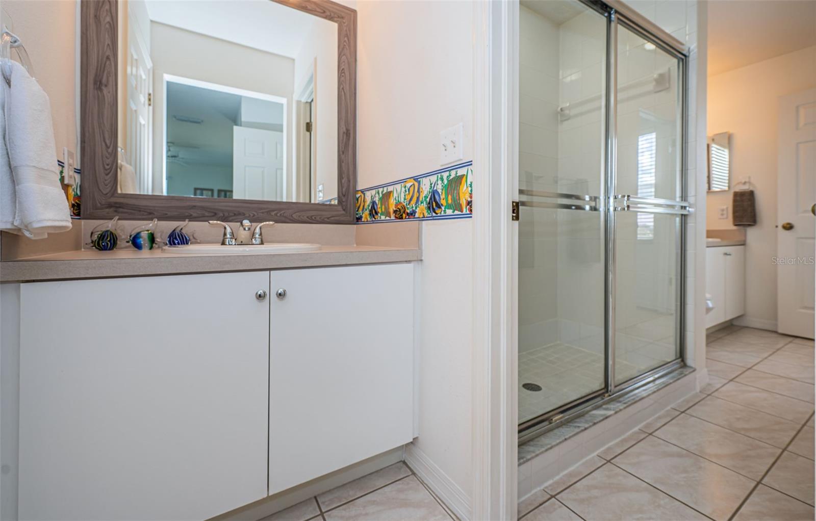 Secondary bathroom with split sinks