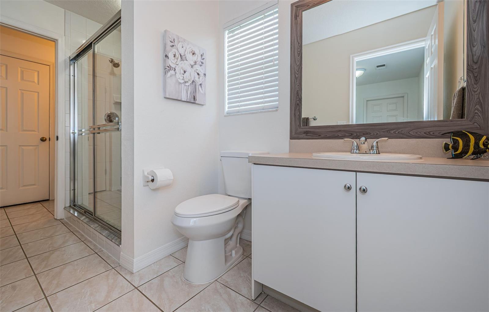 Secondary bathroom with split sinks