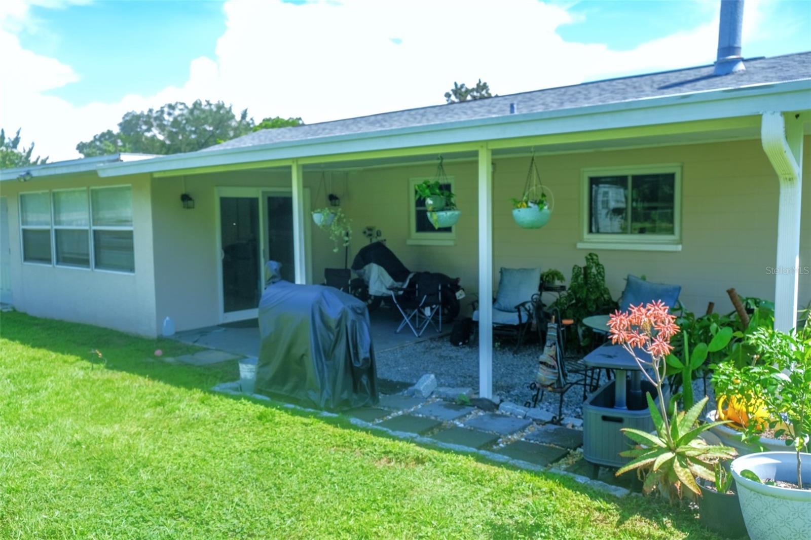 Covered Porch and Carport in Rear