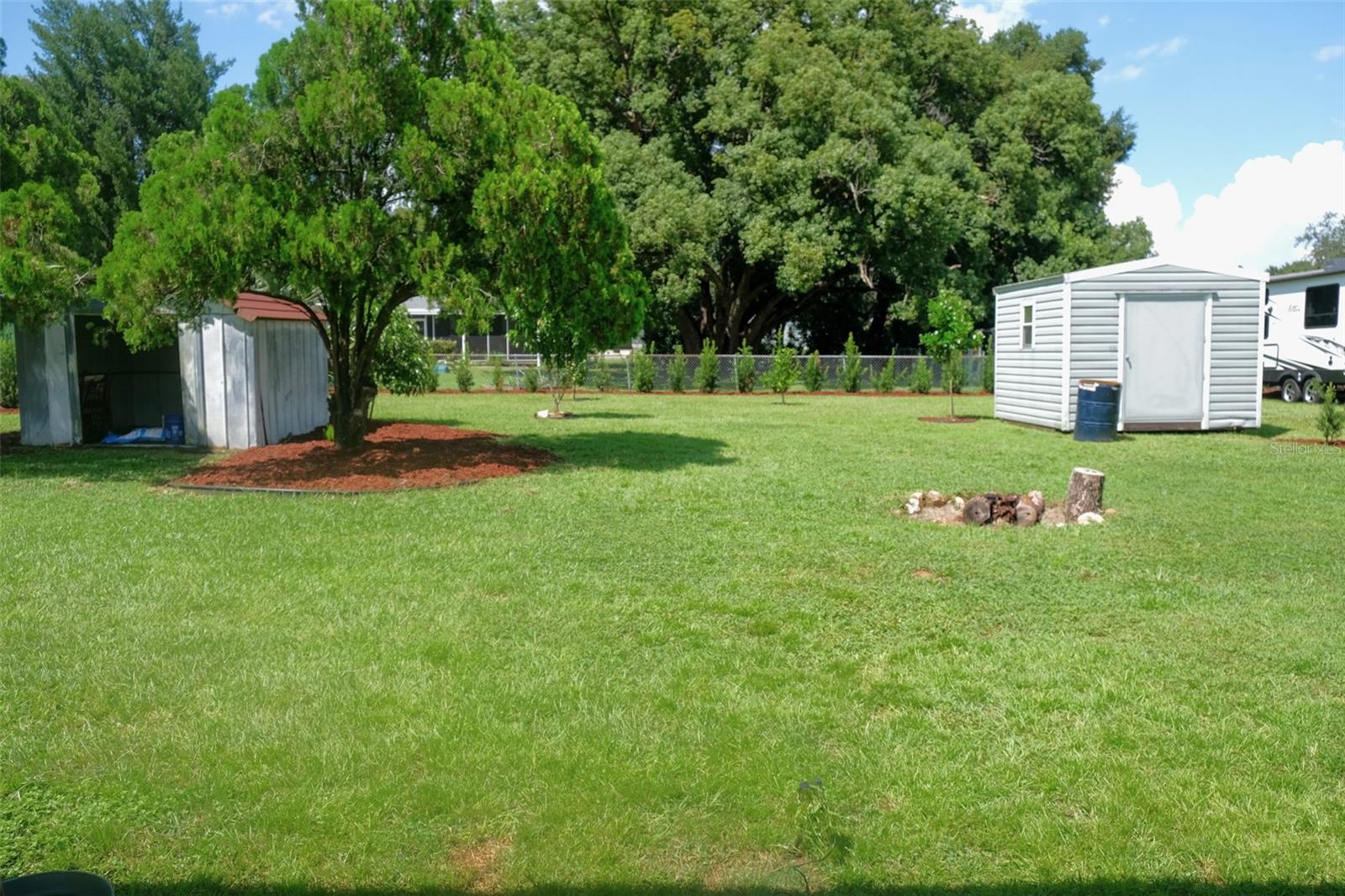 Spacious Yard with Two Sheds (One with electric connected)