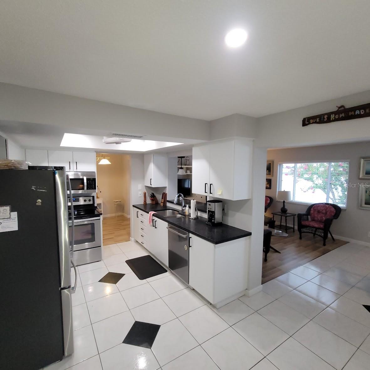 The kitchen is in the middle of the home with easy access from the garage and just off of the family room.