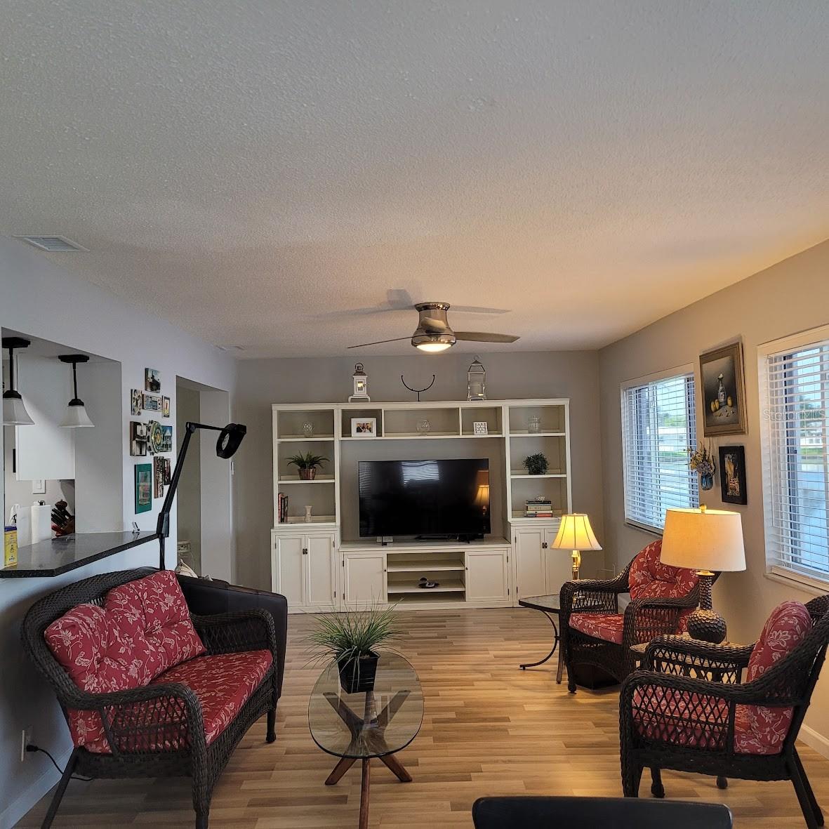 The entertainment Center in the back of this Florida room will not be taking the trip to St. Louis. It will be available to purchase if there is any interest, please ask.