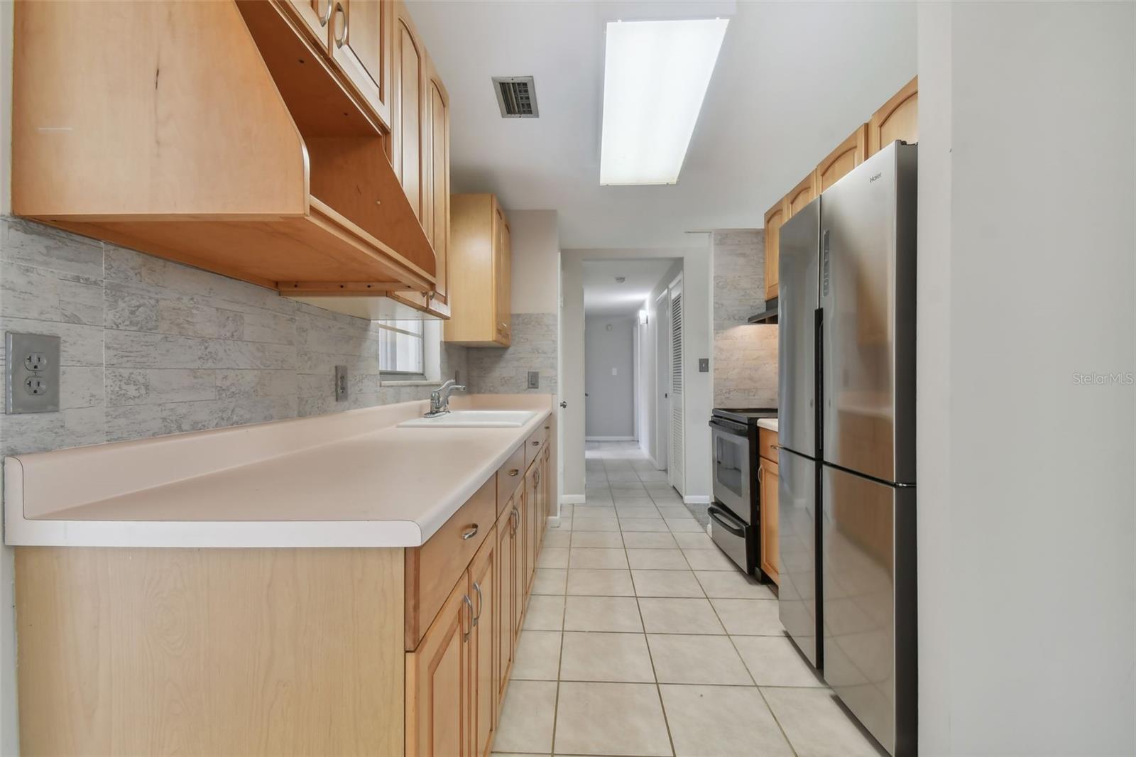 Kitchen has custom cabinetry