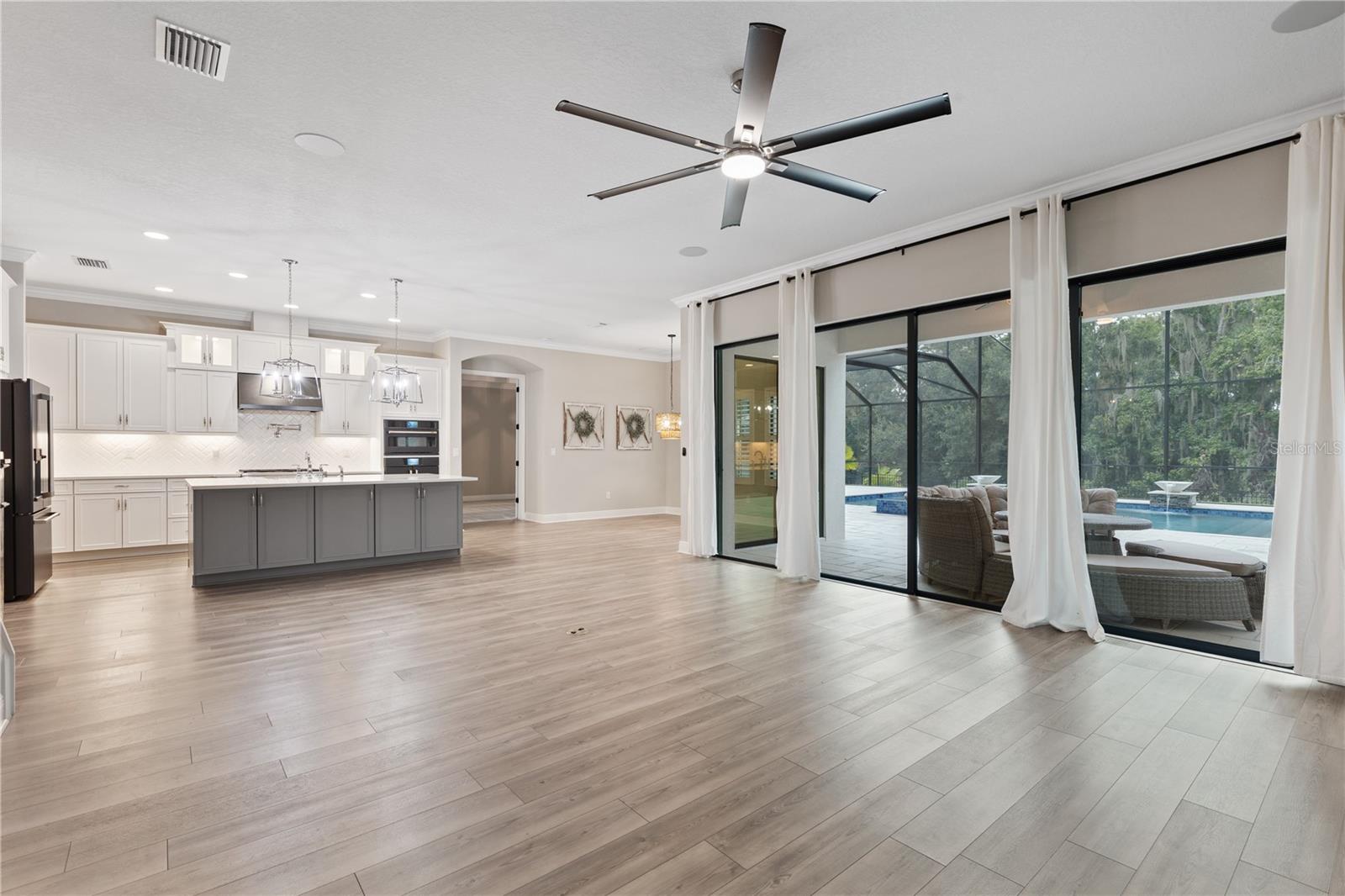 Living Room with 16' Sliding Glass Doors