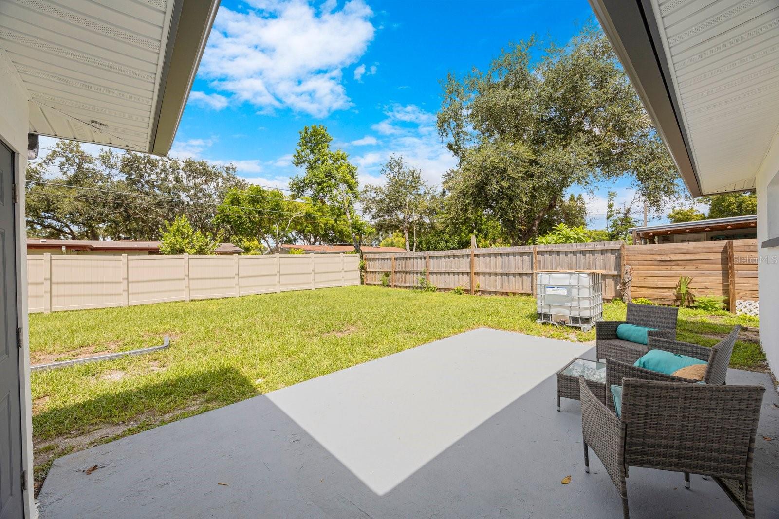 Private fenced in backyard