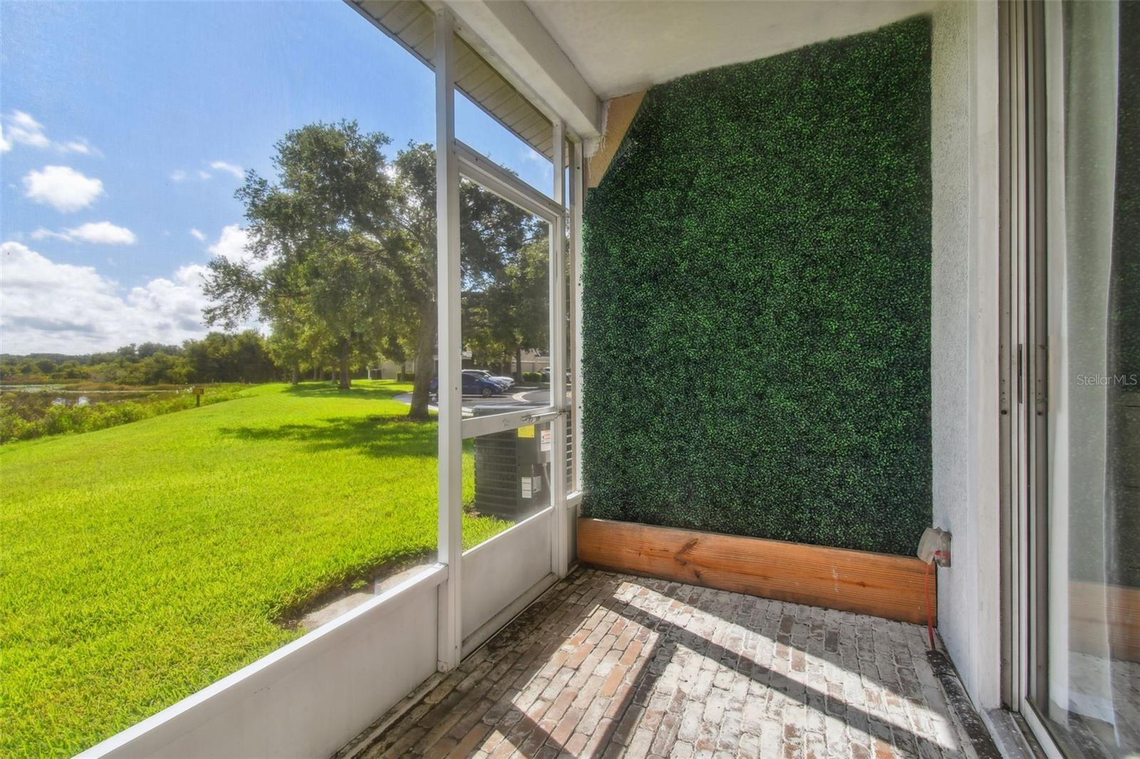 Screened Lanai with Care free living wall