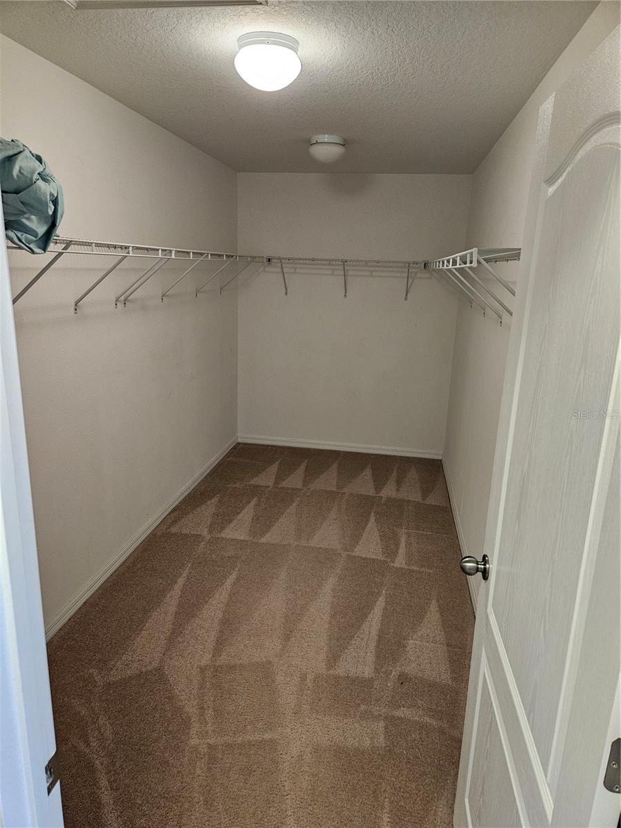 walk-in closet master bedroom