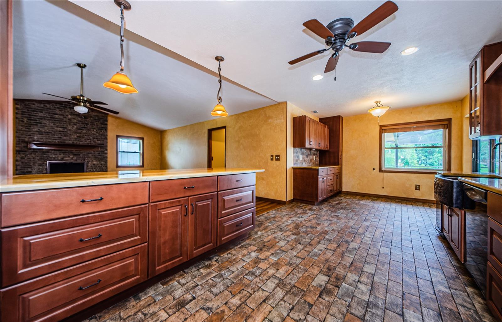 Abundant cabinets in the kitchen plus additional bar area