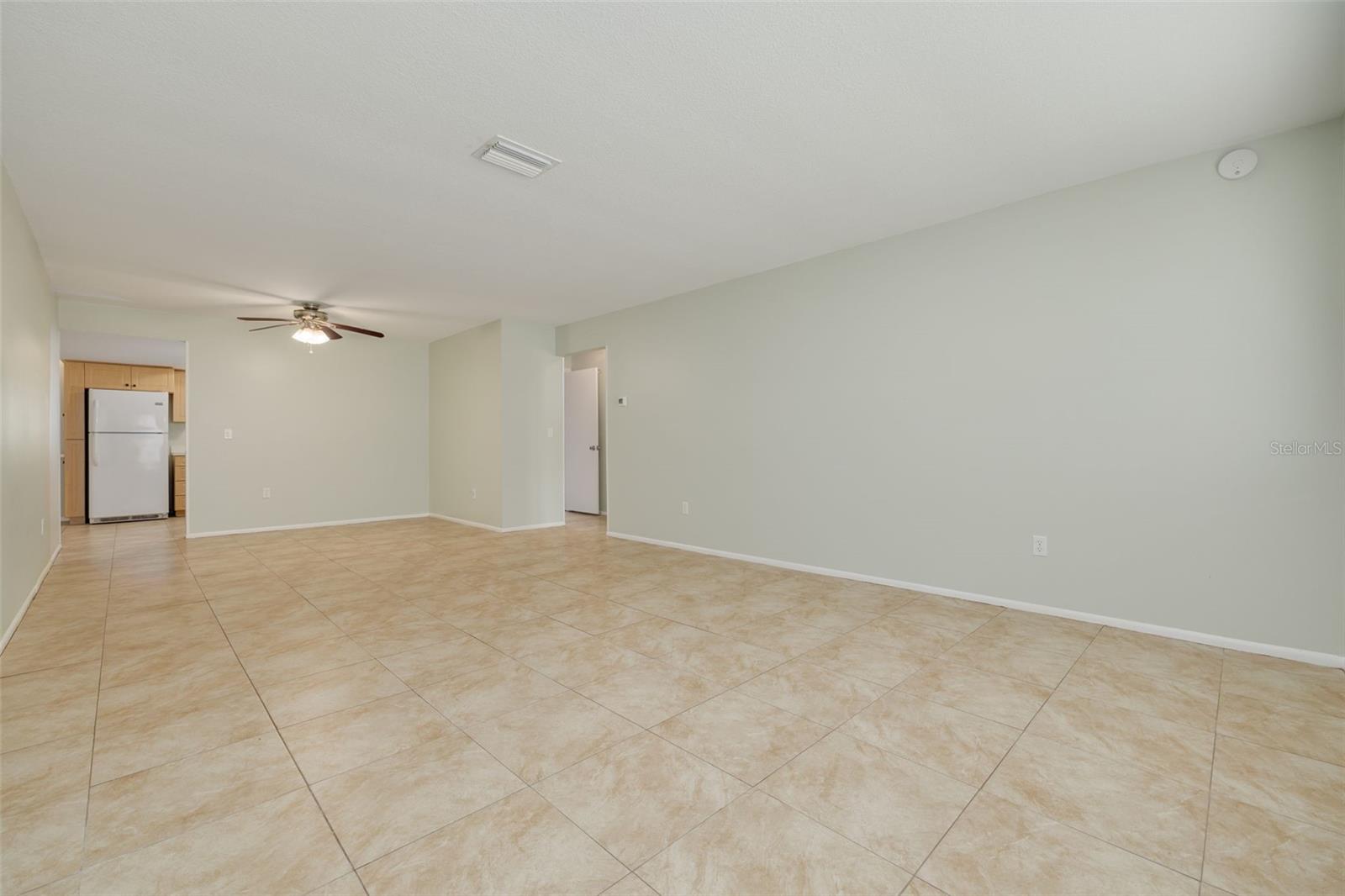 Front living area with view into dining