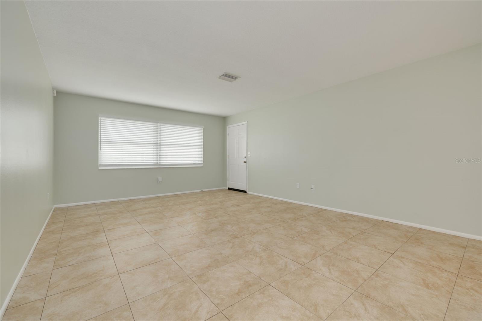 Living room with view to front yard