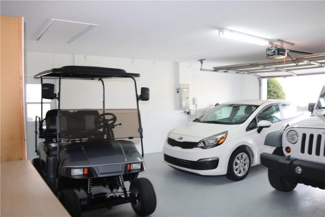 Oversized garage allows sufficient space for 2 cars and a golf cart.