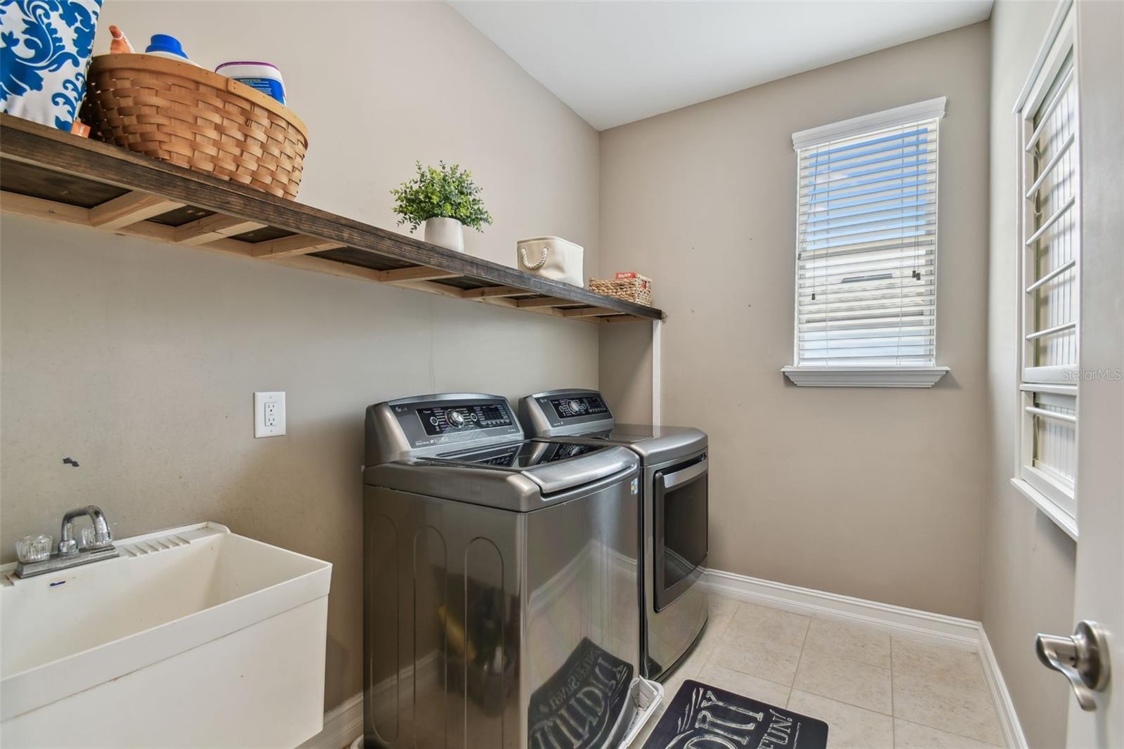 2nd Floor laundry room with utility sink