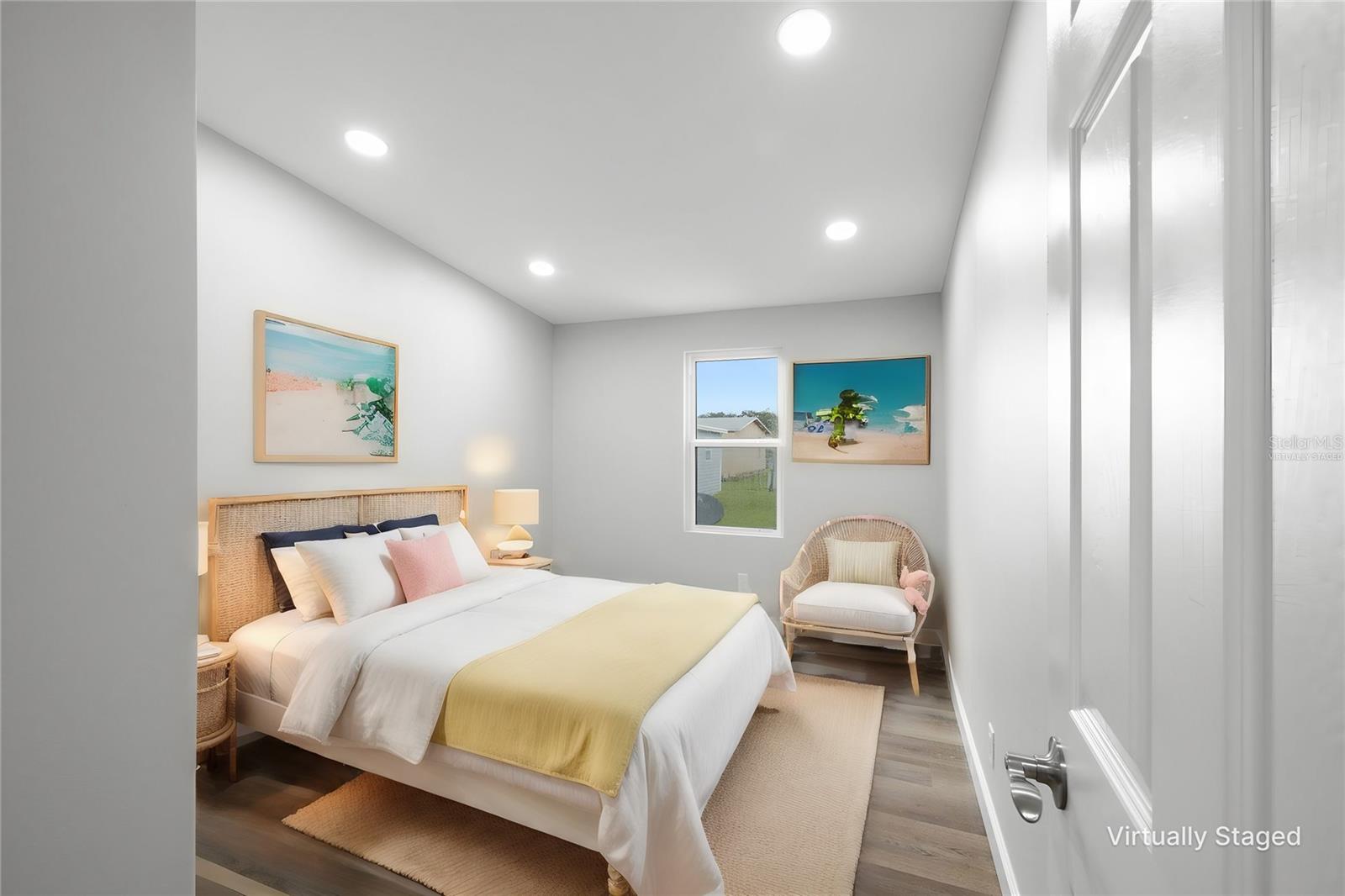 Nice size secondary bedroom with recessed lighting, luxury flooring, new door! (Virtually Staged)