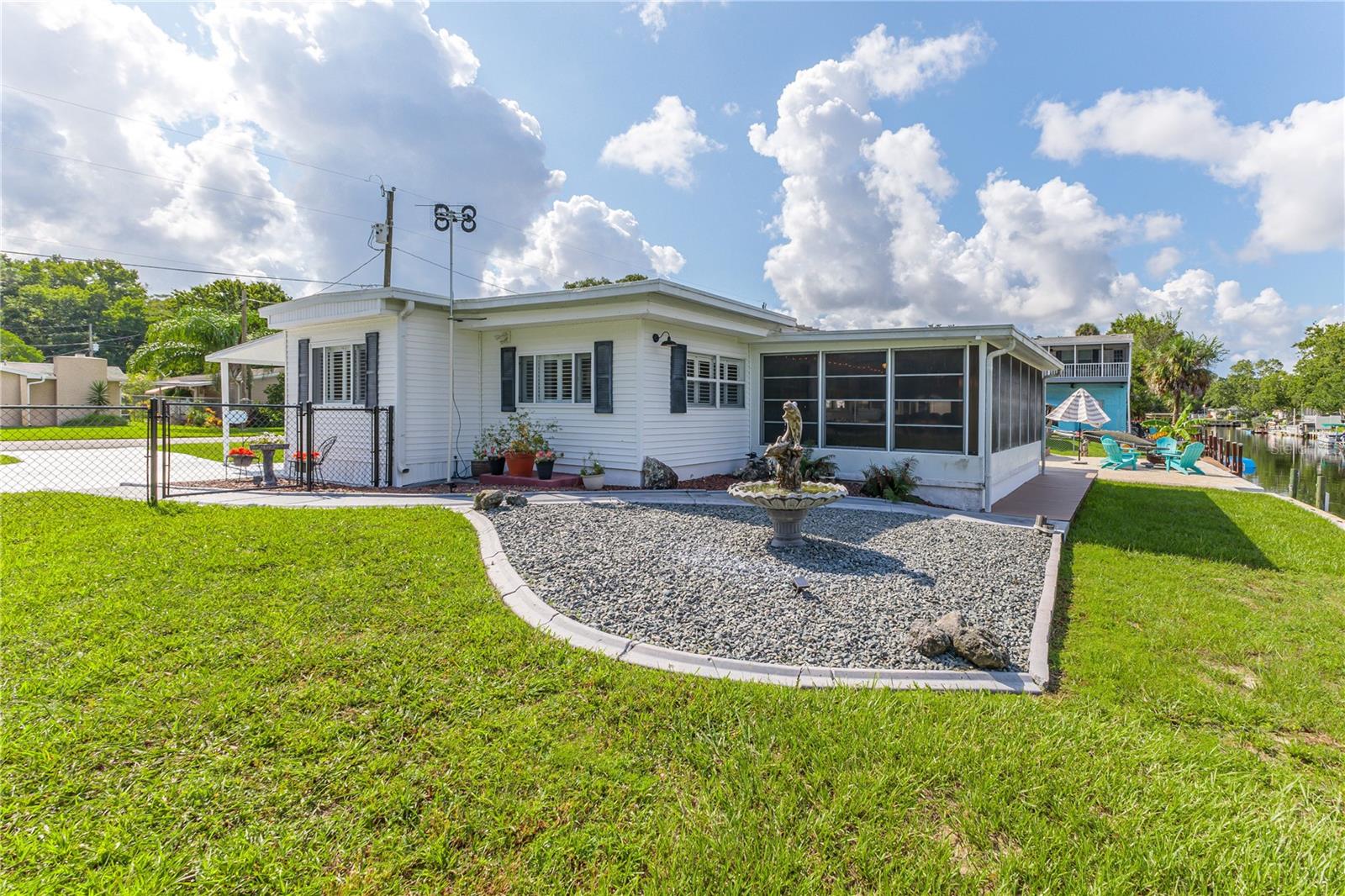 Side Yard with Dolphin Fountain