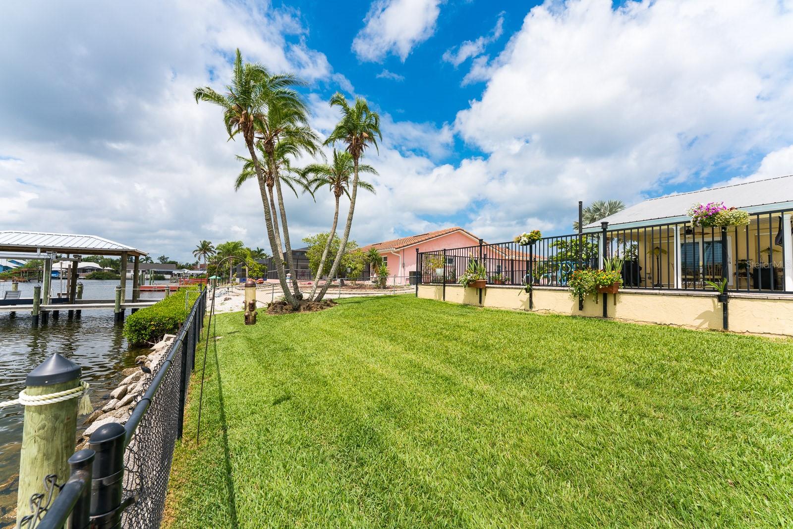 Spacious backyard completely fenced.