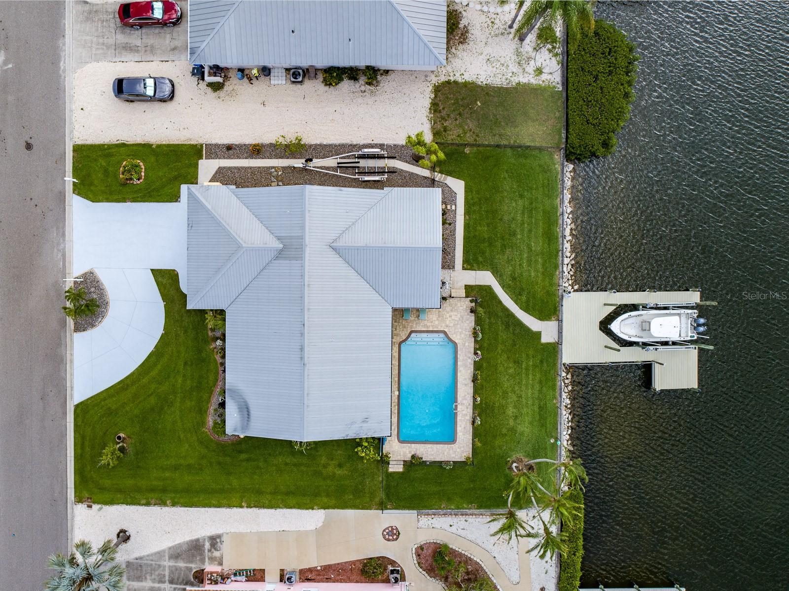 Just bring your boat and move right in to this amazing home! You can enjoy your time in the pool or on your boat.