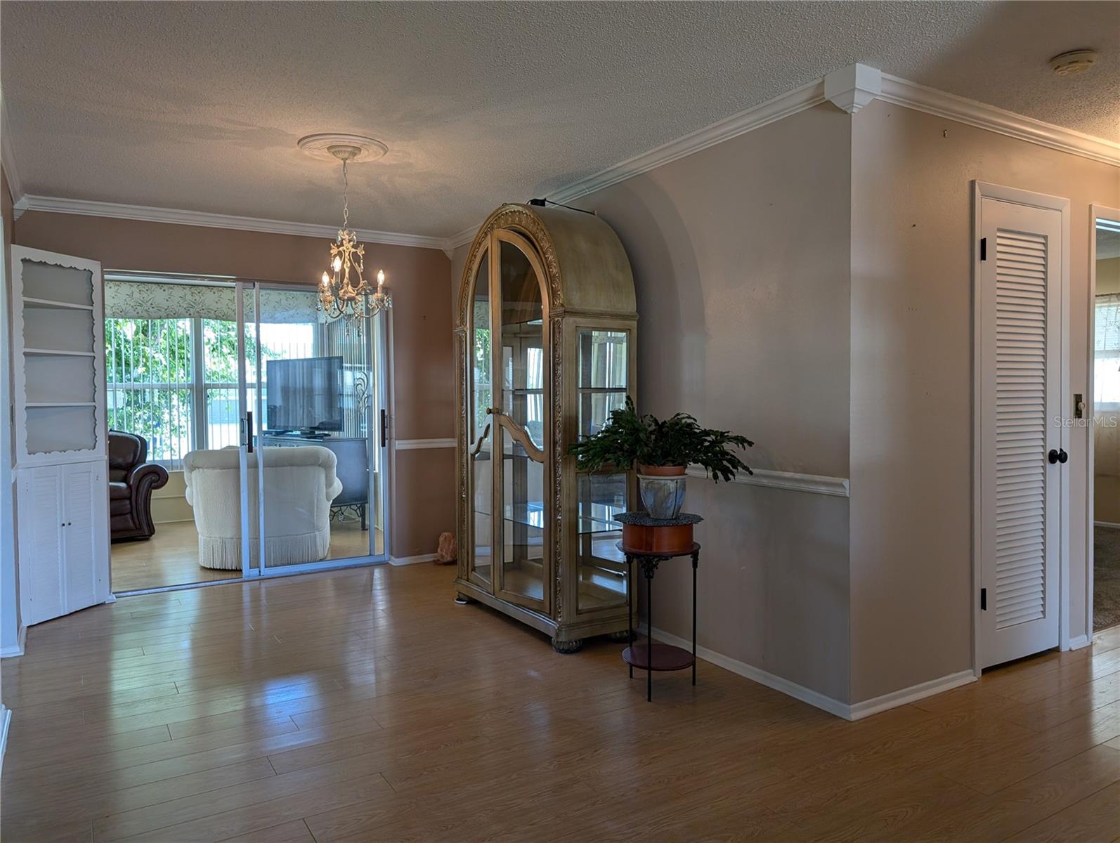 Dining area view into Florida room.