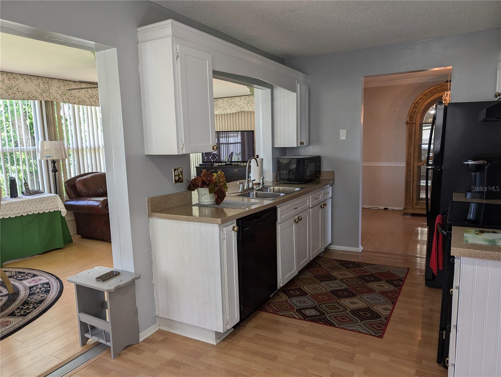 Kitchen is the Heart of the Home...surrounded by the living, dining and Florida rooms.