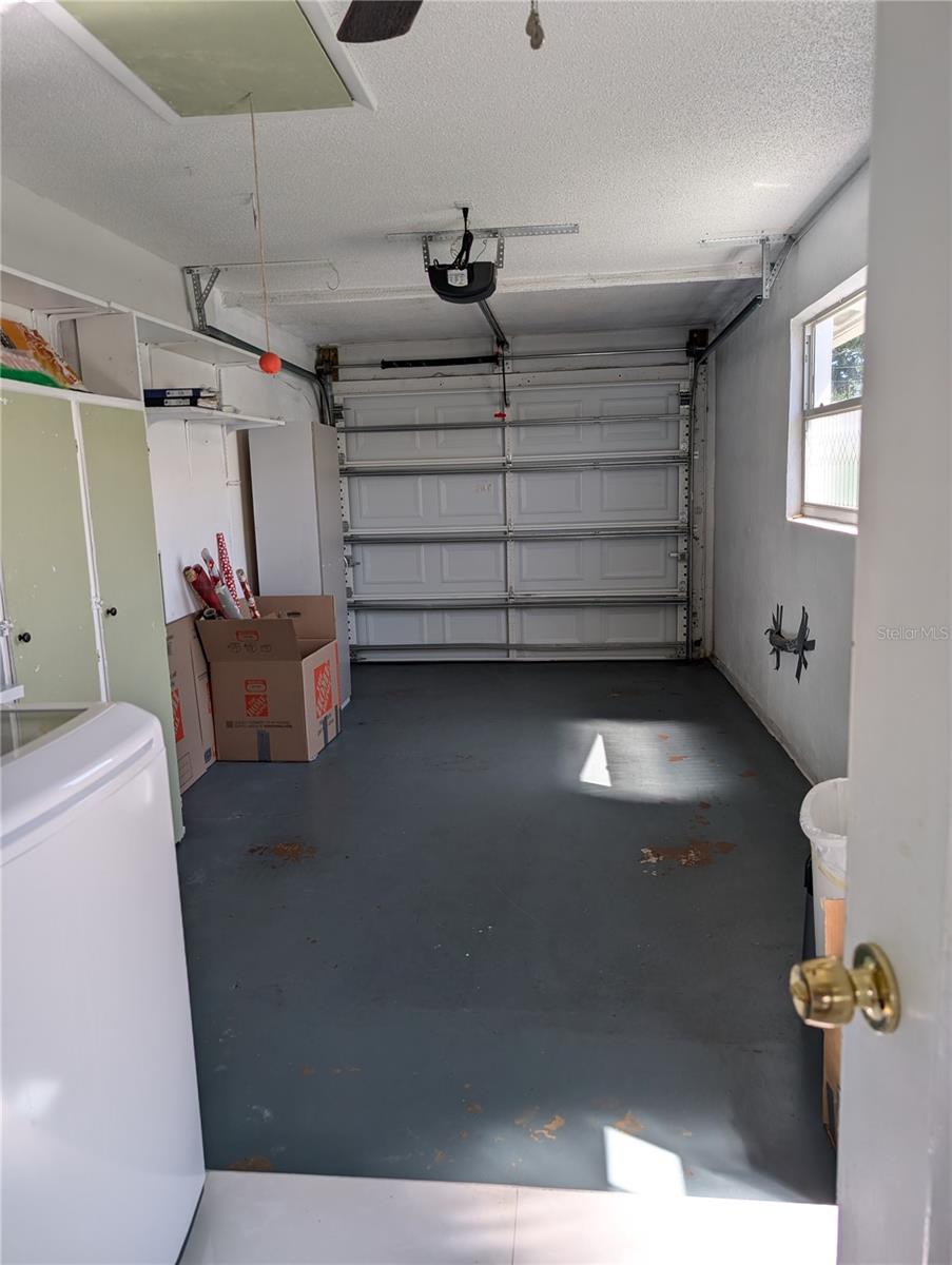 Garage also features a pull-down attic, extra storage and an Amarr impact rated garage door with opener.