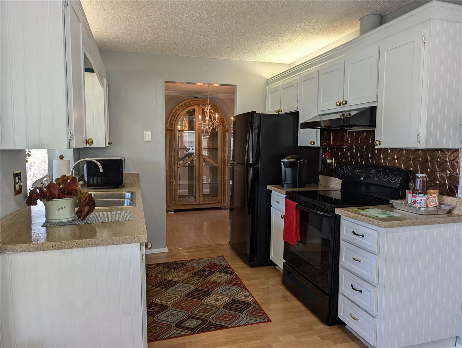 Kitchen view into dining room.