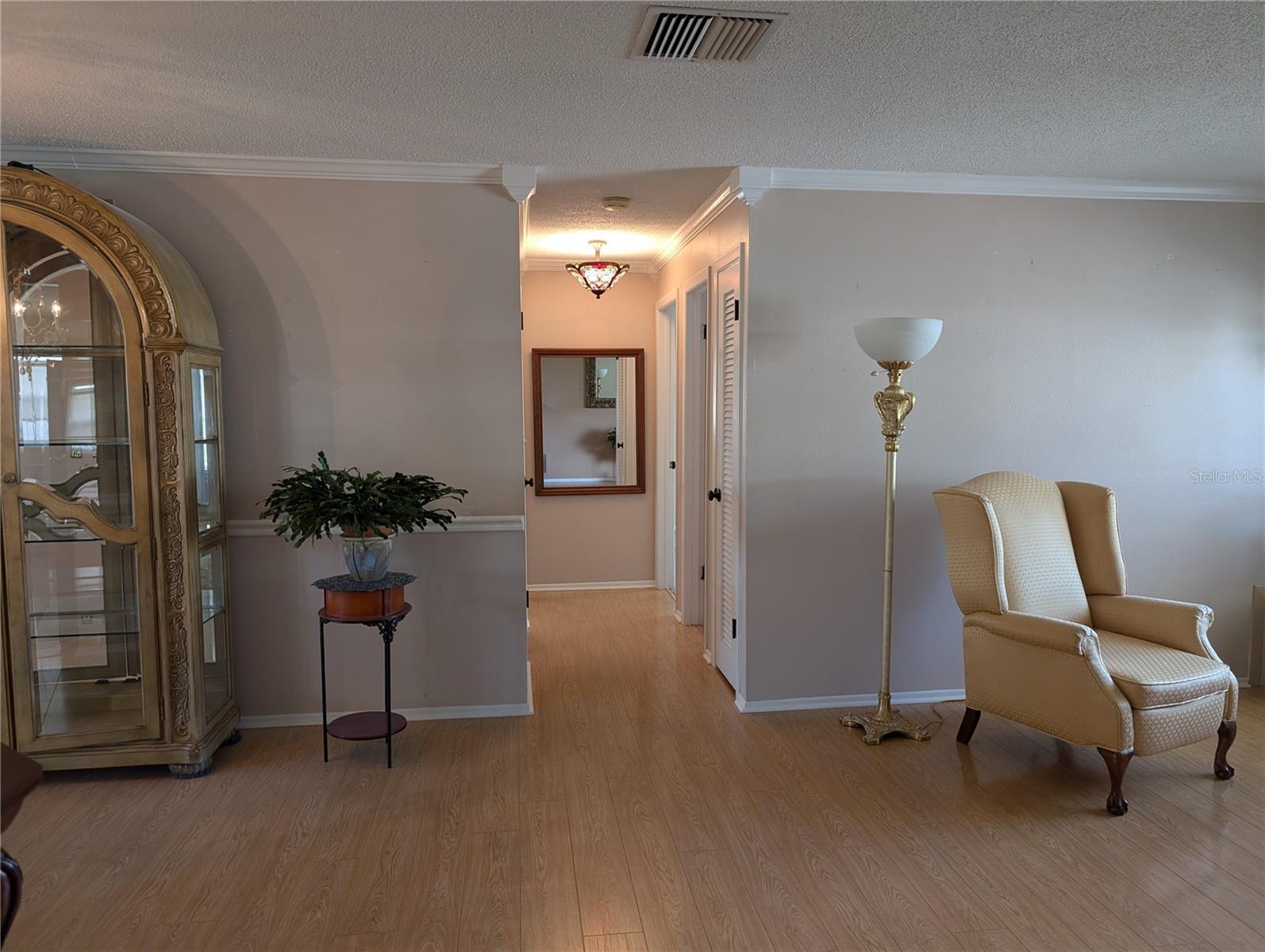 Hallway to bedrooms and baths also offers linen closet and hall closet.