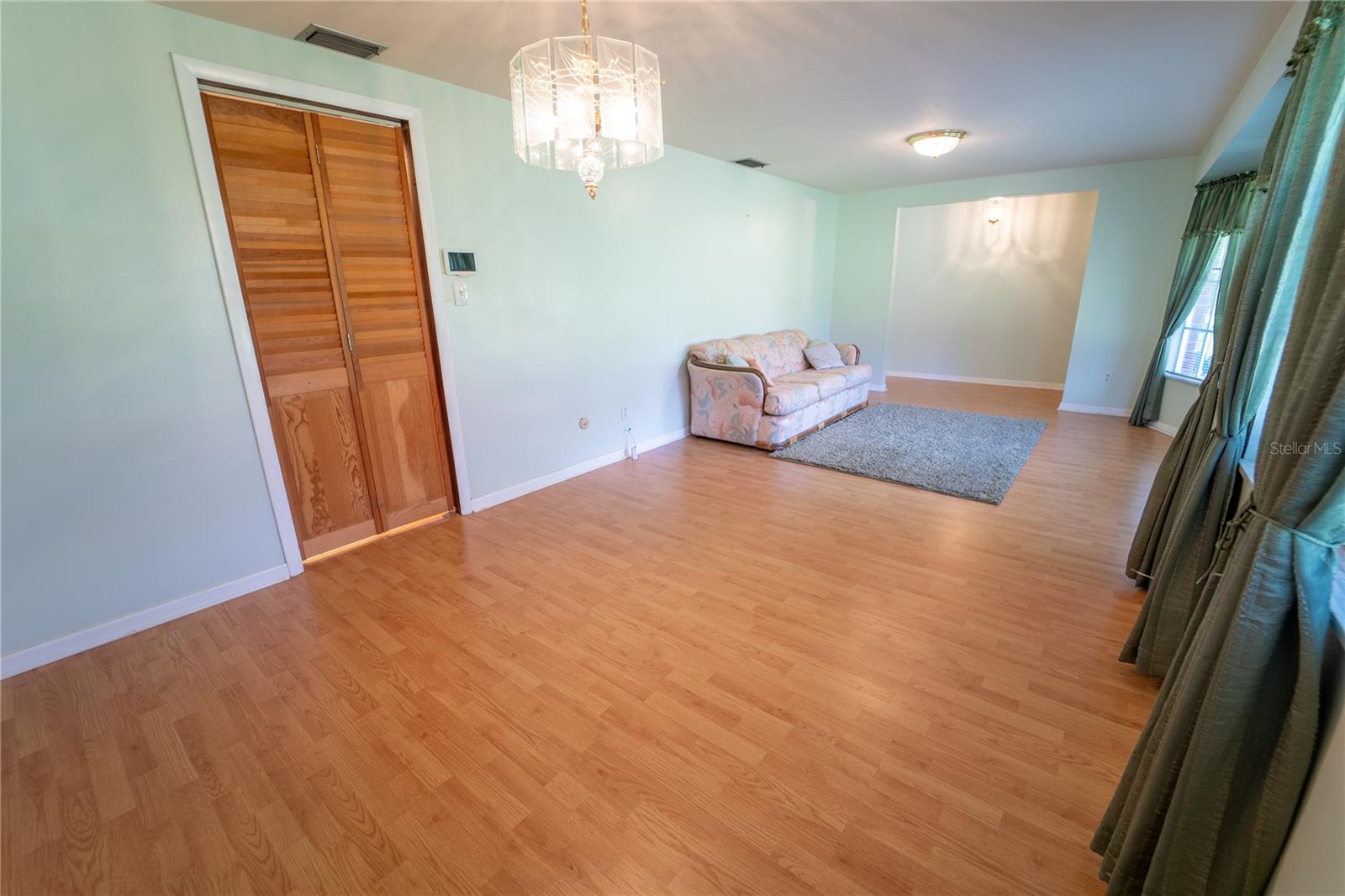 FRONT LIVING ROOM AND FORMAL DINING ROOM