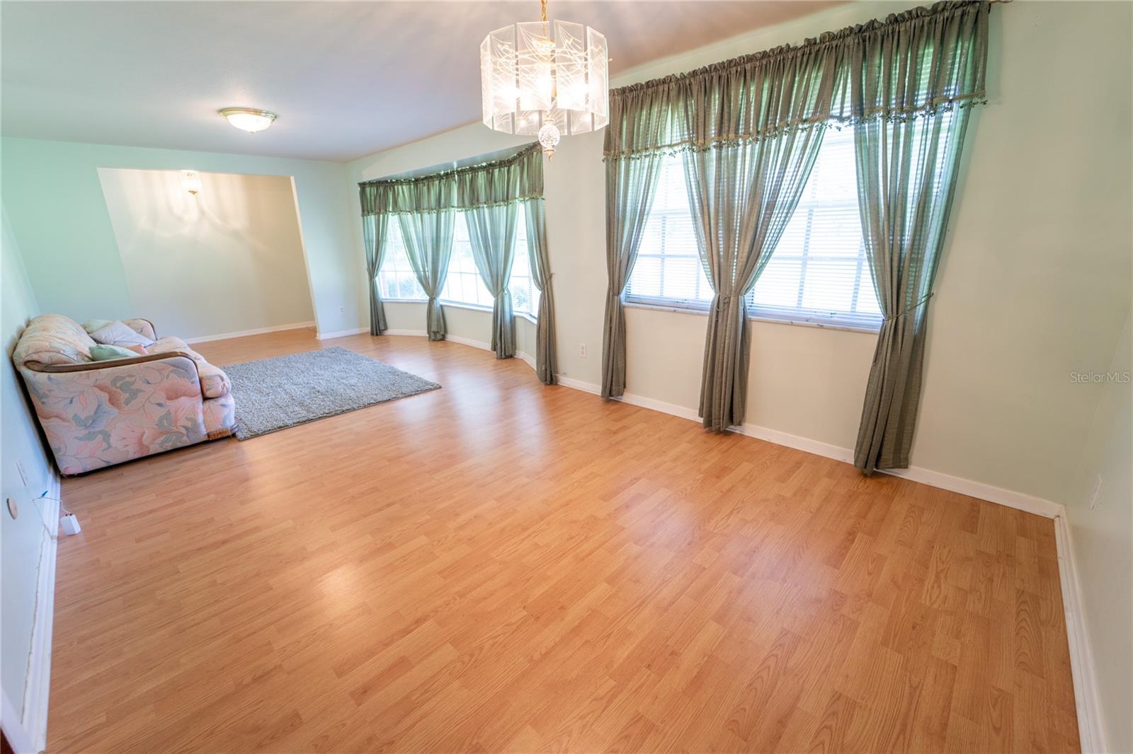 FRONT LIVING ROOM AND FORMAL DINING ROOM