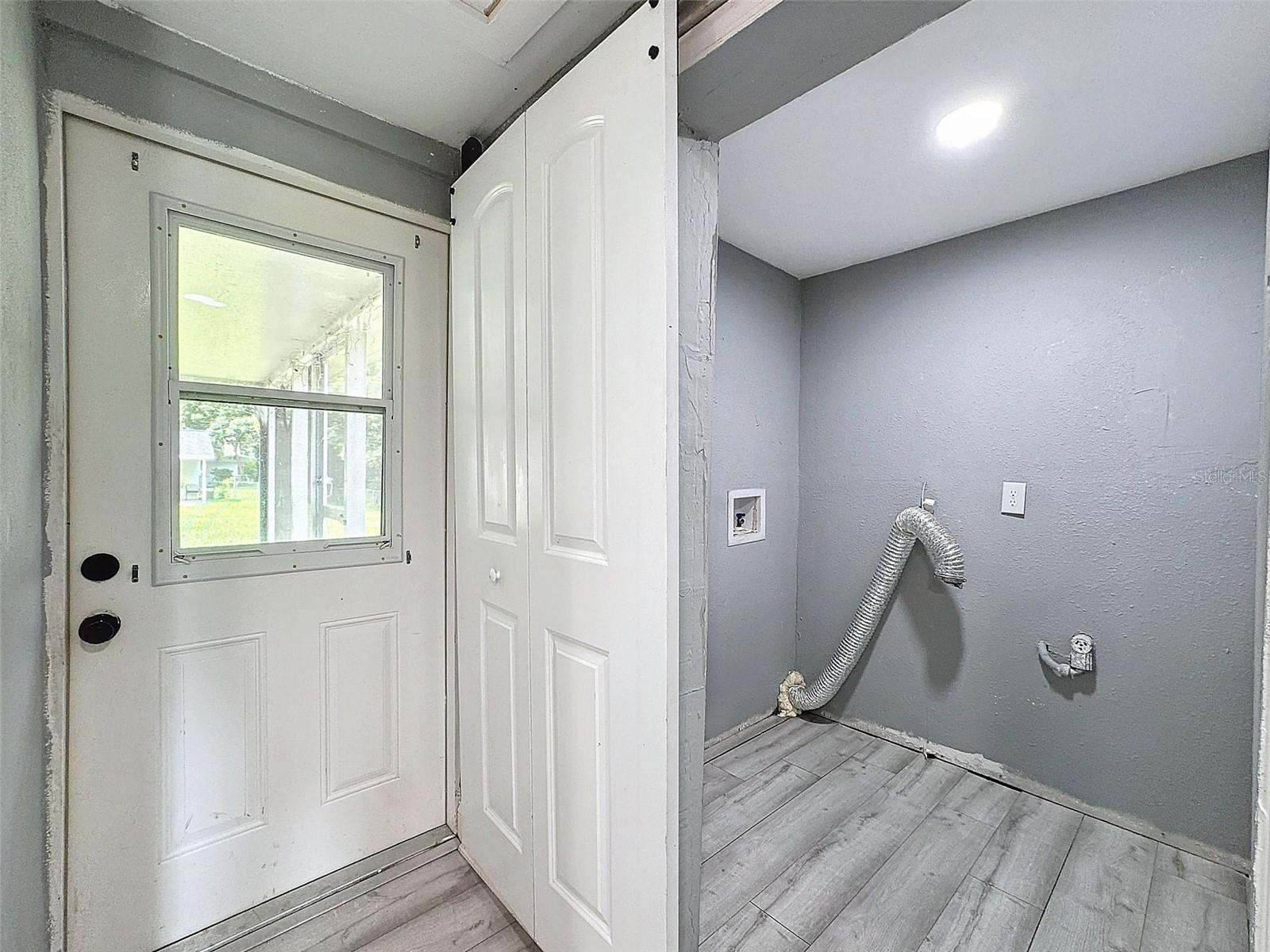 Utility Room next to Kitchen and Rear door