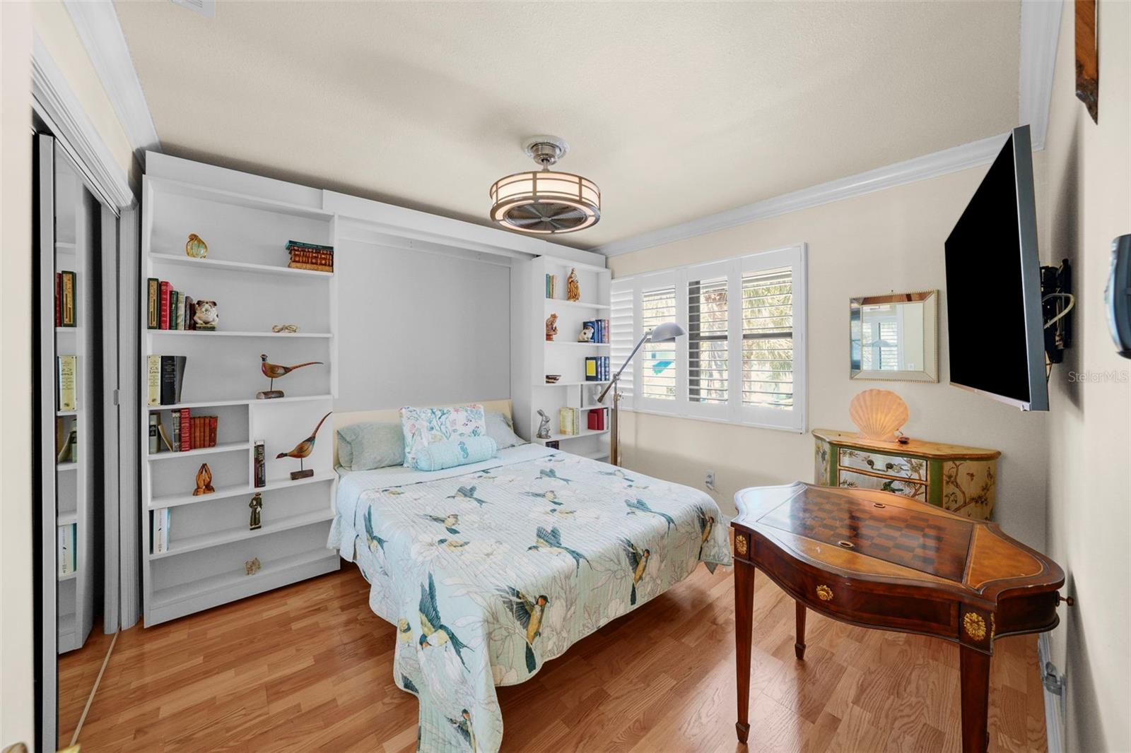 2ND GUEST BEDROOM WITH MURPHY BED AND BOOKCASE