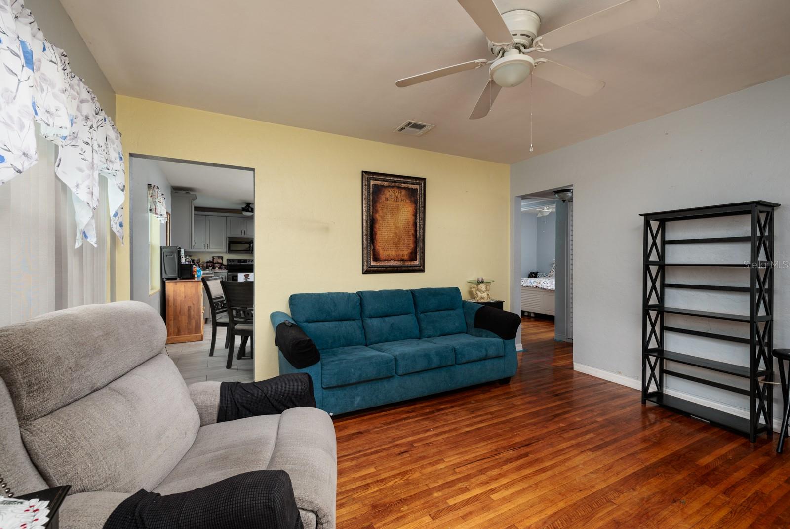 Living Room Into Kitchen View and Hallway