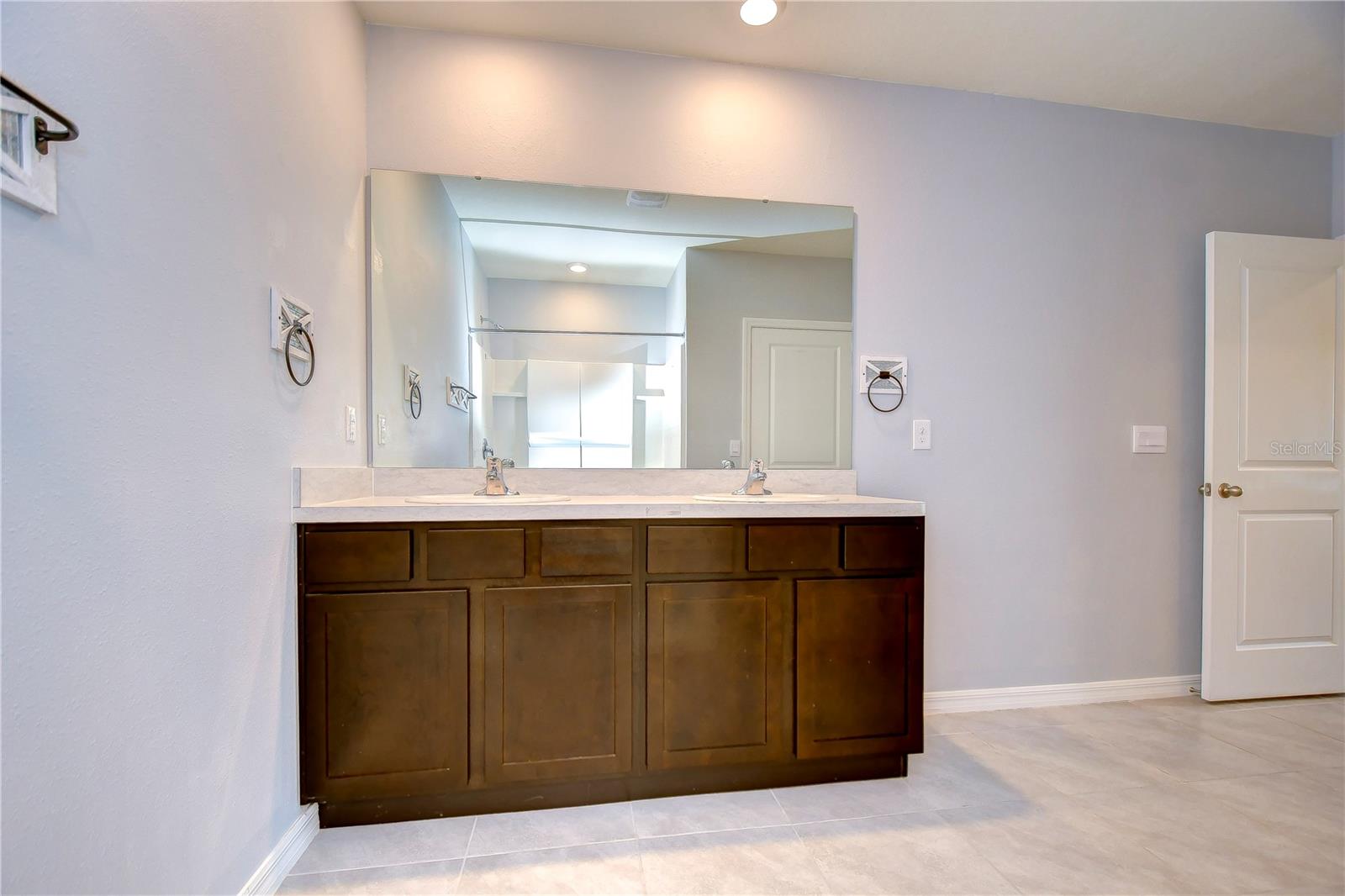 En-suite bathroom featuring a dual sink vanity!