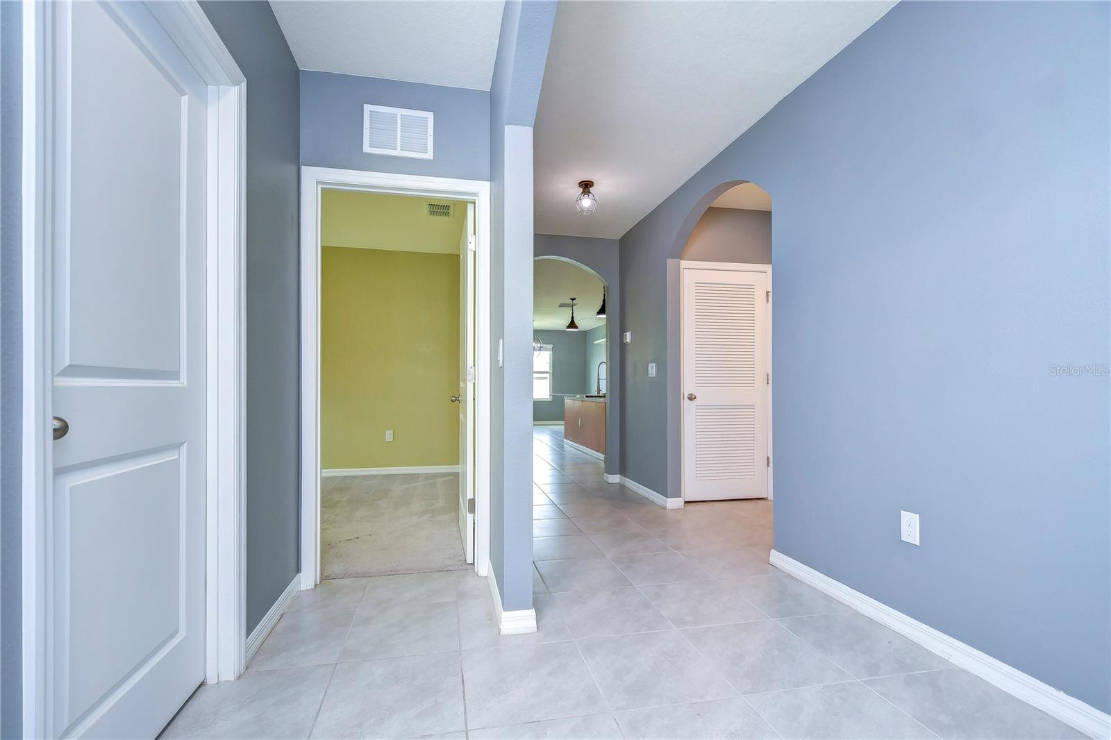 Easy to maintain tile flooring, and neutral paint colors throughout!