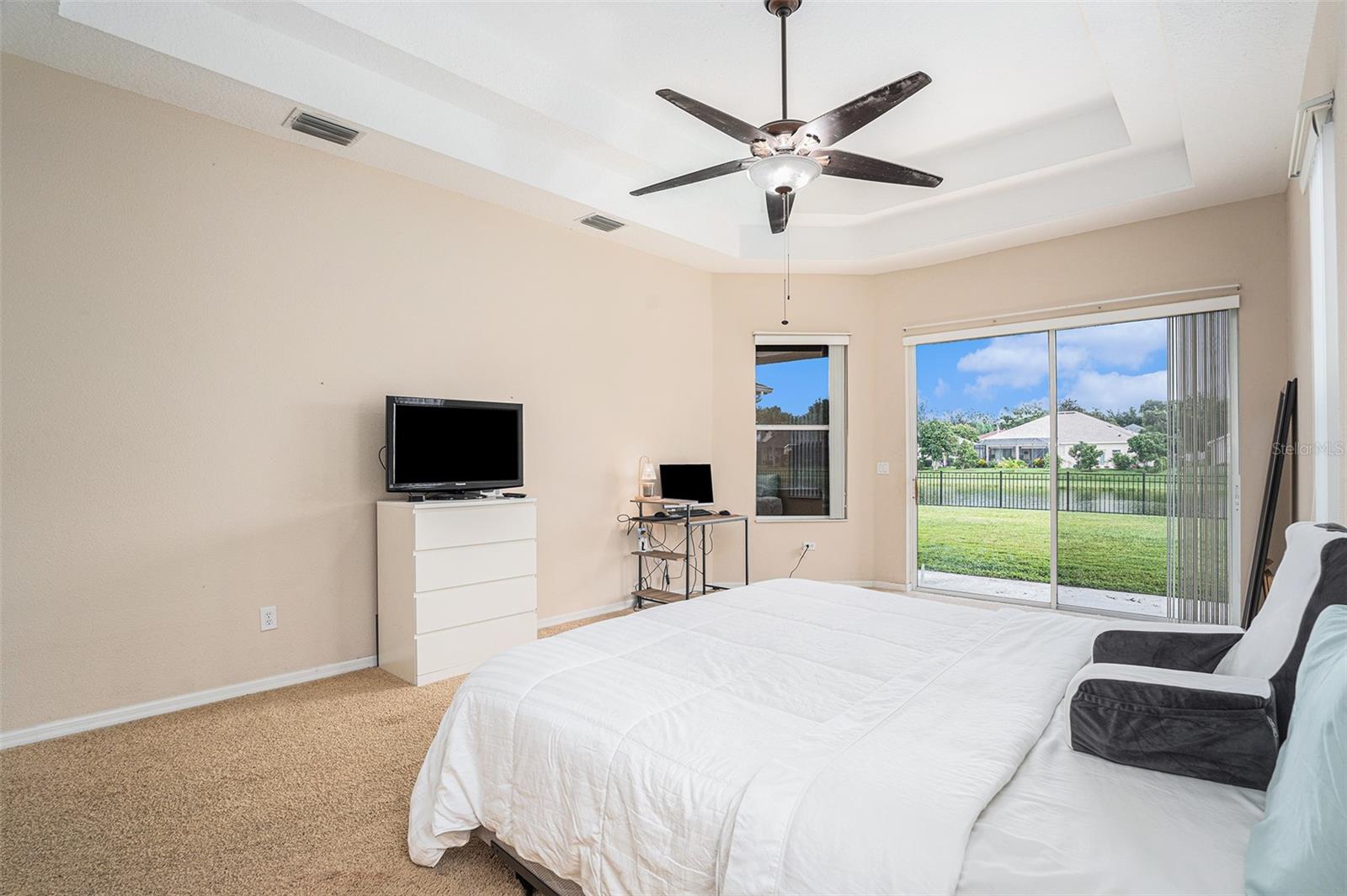 Master Suite with double direct and private access to the backyard and the lanai.