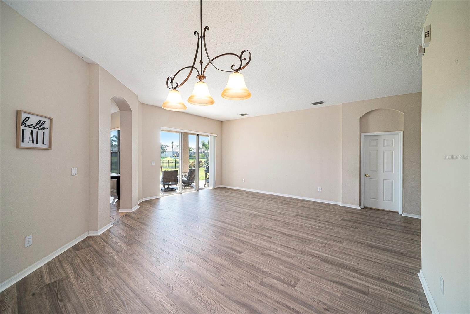 Natural Light! Plant shelves, recessed lighting, art niches, natural light and glass sliding doors to the lanai.