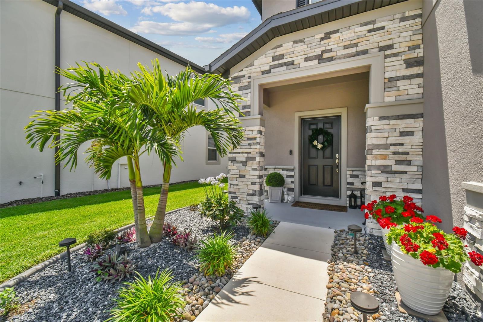 Current backyard with extended paver lanai