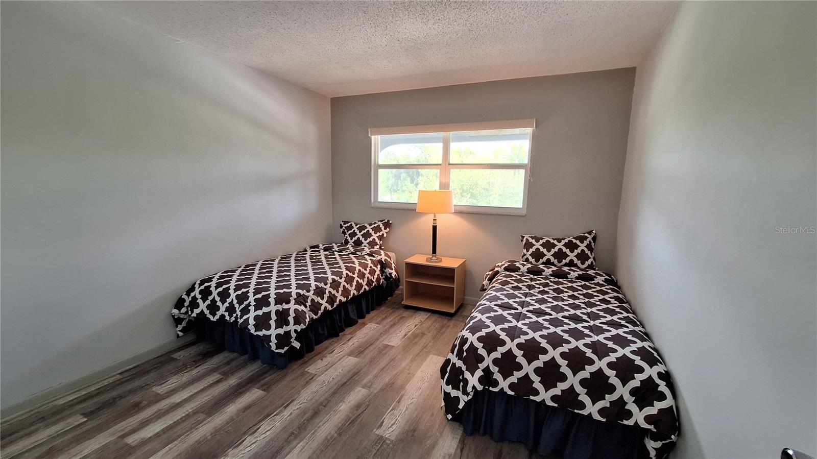 Secondary bedroom with walk-in closet