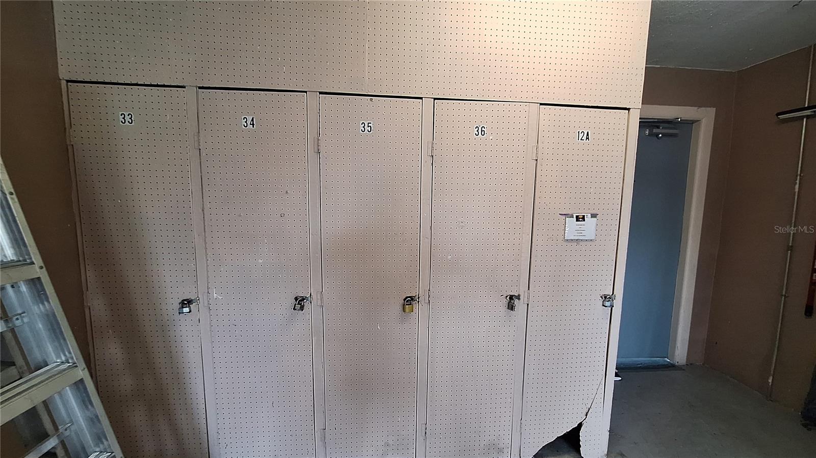 Storage lockers located in laundry room